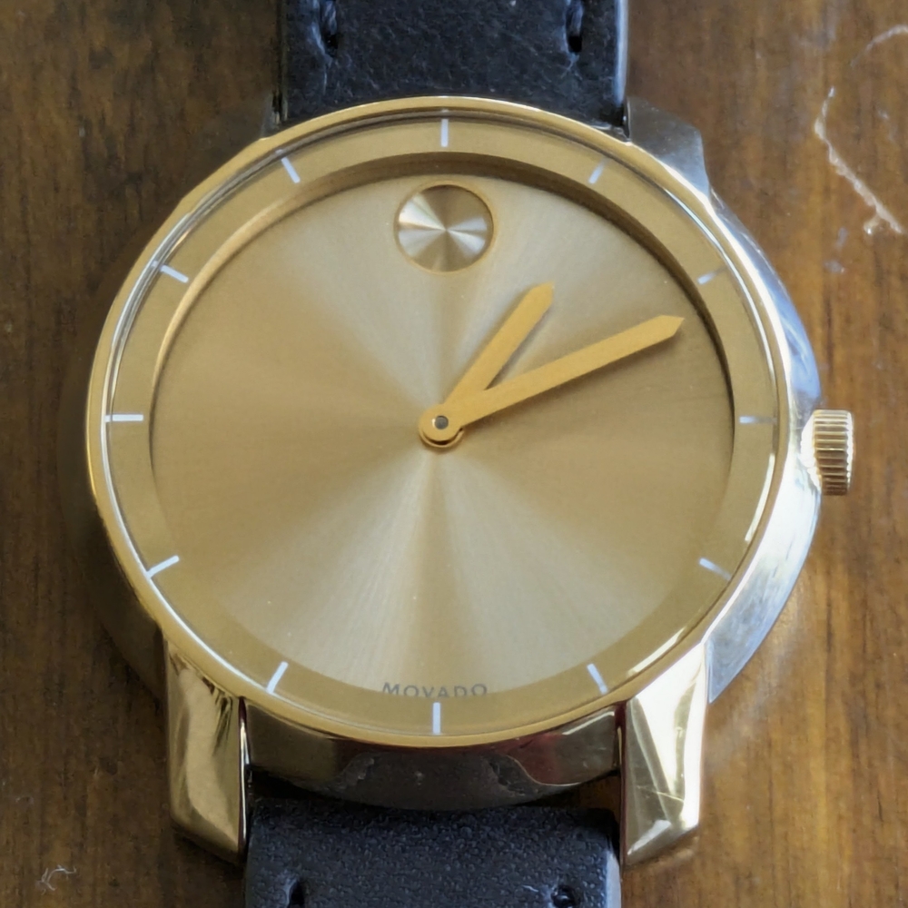 Movado Women's Yellow Gold Sunray Dial Watch Blue Leather Strap 3600474